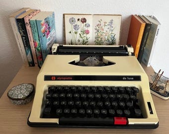 Vintage Olympiette gele typemachine