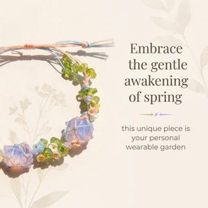May include: A delicate bracelet featuring light blue and purple stones, green beads, and small floral accents. The bracelet is strung on a thin, natural-colored cord. Text: Embrace the gentle awakening of spring.