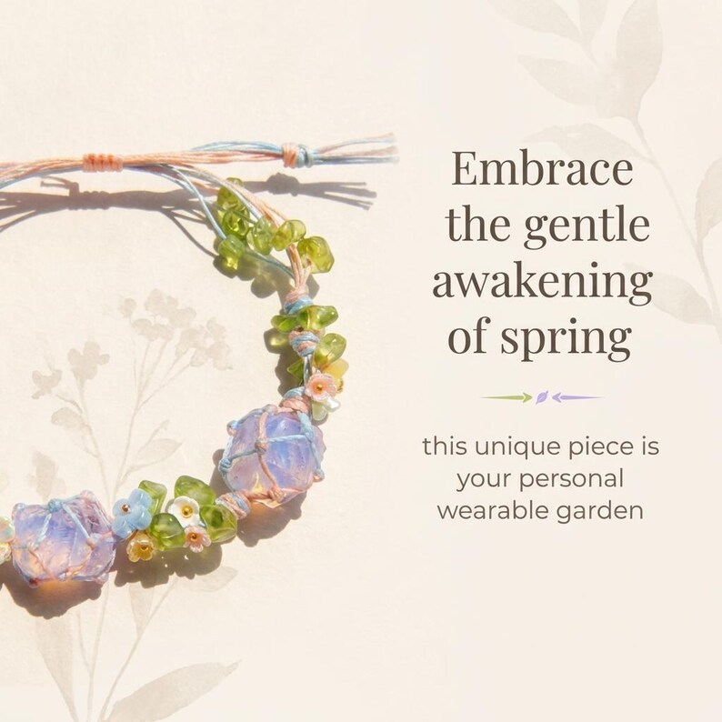 May include: A delicate bracelet featuring light blue and purple stones, green beads, and small floral accents. The bracelet is strung on a thin, natural-colored cord. Text: Embrace the gentle awakening of spring.