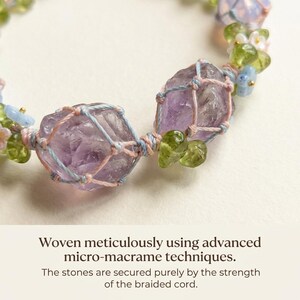 May include: A macrame bracelet featuring large, raw amethyst stones, accented with small green and white beads. The stones are wrapped in a light blue and pink cord, creating a delicate and natural aesthetic.