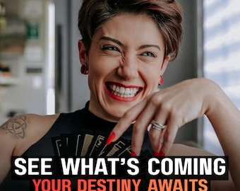 May include: A person with short brown hair and red nail polish holds a fan of black and gold tarot cards. The text on the image reads: SEE WHAT'S COMING YOUR DESTINY AWAITS. The person wears red stud earrings and a black sleeveless top.