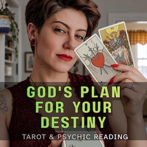 May include: Two tarot cards held up, one showing a red heart pierced by three swords and the other depicting a figure under a sun. The text reads GOD'S PLAN FOR YOUR DESTINY and TAROT & PSYCHIC READING. The cards feature detailed illustrations.