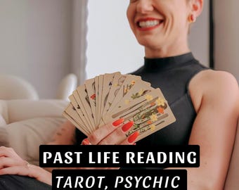 May include: A woman smiles while holding a spread of tarot cards. The text "PAST LIFE READING TAROT, PSYCHIC" is displayed below the cards.