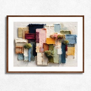 May include: Abstract art print with a collage of textured, rectangular shapes in various colours, including blue, pink, yellow, and green. The artwork is framed in a brown wooden frame, suitable for home decor.