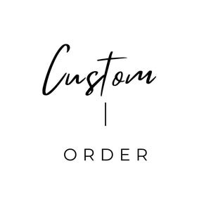 May include: White background with the words "Custom" in a black, elegant script font above the word "ORDER" in a simple, sans-serif font. A vertical line separates the two words.