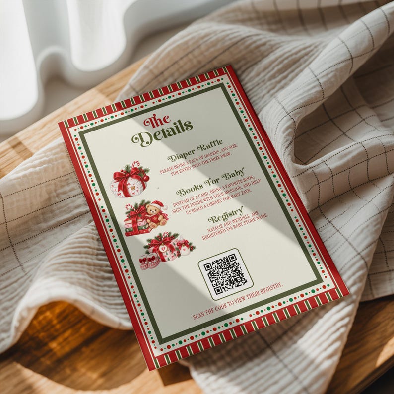May include: A rectangular baby shower invitation card with a red and green border featuring Christmas-themed illustrations of gifts and a teddy bear. The text includes The Details, Diaper Raffle, Books For Baby, Registry, and a QR code for scanning.