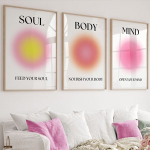 May include: Three framed prints with a gradient circle in each. The top of each print has a word: "SOUL", "BODY", and "MIND". Below the circles are the phrases: "Feed Your Soul", "Nourish Your Body", and "Open Your Mind".