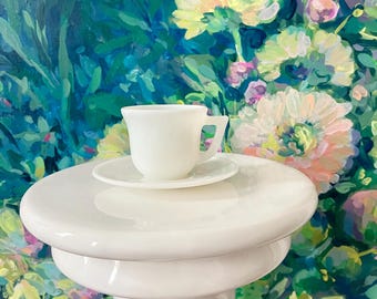 Taza y platillo de vidrio opalino vintage