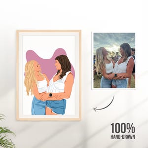 May include: A framed illustration of two women embracing, with one blonde and one brunette. They wear white tops and denim shorts, set against a pink backdrop. A smaller photo of the women is next to the illustration. The text "100% HAND-DRAWN" is at the bottom.