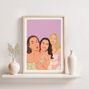 May include: A framed portrait featuring three women in a cartoon style. The women are depicted with fair skin, wearing summer attire, and smiling. The background is a solid lavender color. The frame is a light wood color.