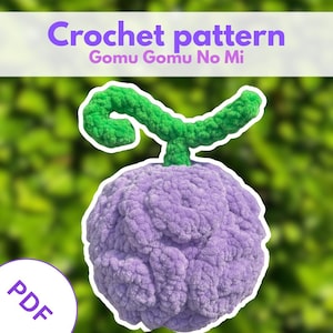May include: A crochet pattern for a Gomu Gomu No Mi, featuring a plush, textured purple fruit with a green stem and curly leaf. The text Crochet pattern Gomu Gomu No Mi is displayed at the top, and a white circular PDF icon is in the corner.
