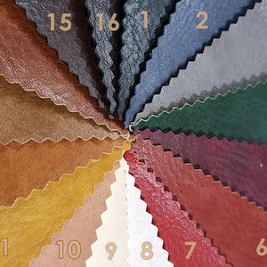 Könnte beinhalten: Eine Farbpalette von Lederproben in verschiedenen Farbtönen, kreisförmig angeordnet. Die Muster reichen von Dunkelblau und Grau bis hin zu Rot, Braun und Gelb. Jede Probe ist zur einfachen Referenz nummeriert und zeigt eine Vielzahl von Texturen und Farbtönen.