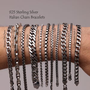 May include: A collection of sterling silver Italian chain bracelets in various styles, including Mariner Flat, Cable Anchor, Rambo, and Cuban Chain designs. The image displays the bracelets against a neutral background, showcasing their intricate links and textures. Text reads "925 Sterling Silver Italian Chain Bracelets."