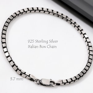 May include: A 925 sterling silver Italian box chain bracelet with a lobster claw clasp. The chain features square-shaped links and is marked with a width of 3.7 mm. The text 925 Sterling Silver Italian Box Chain is visible in the center.