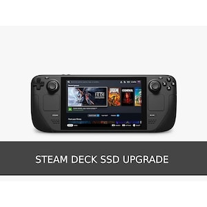 May include: A black Steam Deck handheld gaming console with a screen displaying game titles like "Jedi" and "Doom". The console has buttons, joysticks, and a touchpad. The text "Steam Deck SSD Upgrade" is at the bottom.
