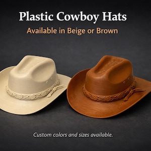 May include: Two plastic cowboy hats, one beige and one brown, featuring a molded crown, a wide brim, and a decorative band with a repeating circular pattern around the base. The text reads: Plastic Cowboy Hats, Available in Beige or Brown.