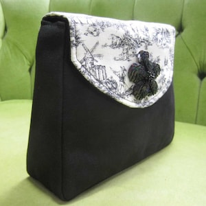 Bolso o cartera en tejido Toille negro/blanco