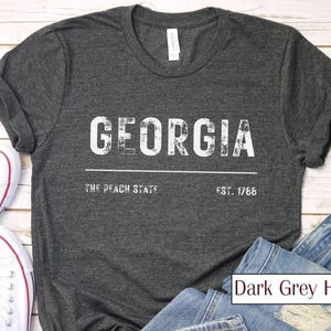 Georgia The Peach State Est. 1788 | Rustic Bella Canvas 3001 Tee – Bold, Eco-Friendly & Stylish | Minimalist Apparel | Unisex T-shirt