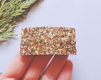 Pinza para el pelo con purpurina gruesa y campanas navideñas doradas