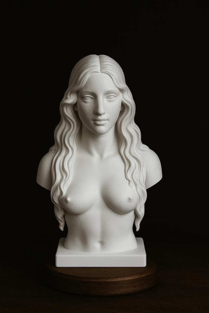 May include: A white bust of a woman with long, wavy hair and a serene expression. The sculpture is mounted on a square base and a round wooden stand, set against a dark background. The bust is a classical art piece.