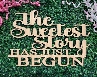 Letrero de madera La historia más dulce acaba de comenzar
