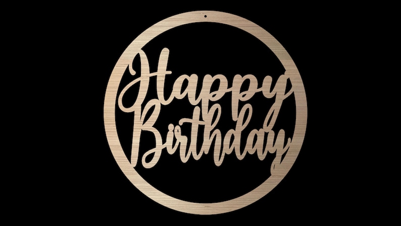 May include: A wooden circle with the words "Happy Birthday" cut out in a cursive font.