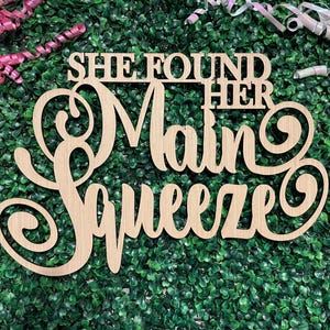 She found her Main Squeeze sign, bridal shower backdrop, bride to be decor