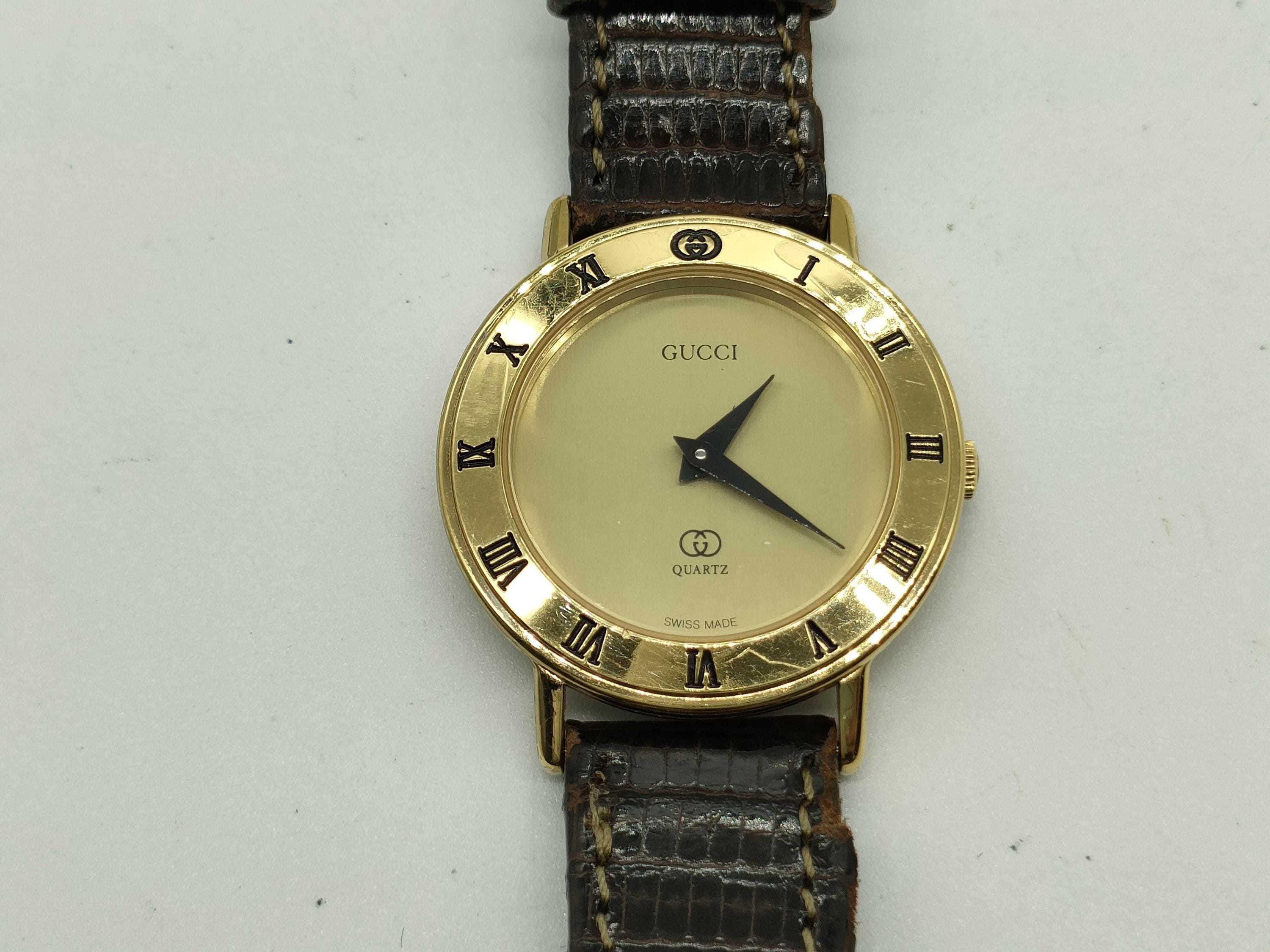 Gucci gold vintage watch - Etsy 日本