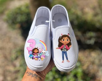 Zapatos sin cordones de la casa de muñecas de Gabby