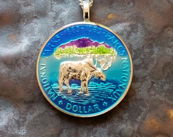 Coin from Canada, hand painted by Ann Nolen. Moose & National Parks Pendant. Coin size Large, about 1-1/2 inch. Coin date 1985. Silver!