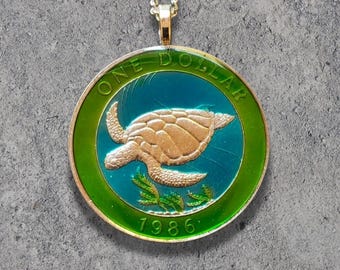 Hand Painted Bermuda Coin. Sea Turtle Pendant. 1-1/2 inch coin dated 1986.