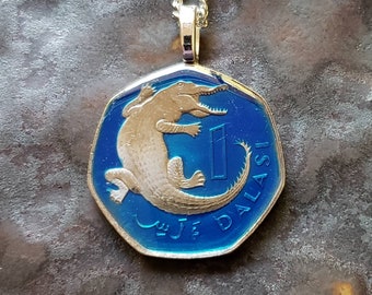 Gambia - Crocodile Coin Pendant. Hand Painted by Ann Nolen. Coin size Small, about 1-1/8 inch. Coin date 1998 or 2011.