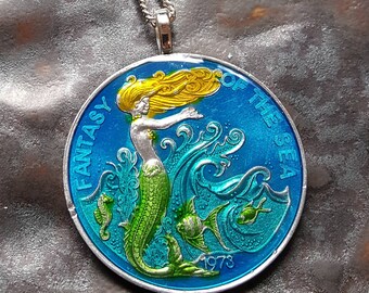 Mardi Gras Token - Mermaid Coin Pendant. Hand Painted by Ann Nolen. Coin size large, about 1-1/2 inch. Coin date 1973.