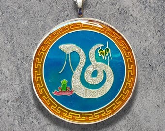 Hand Painted China coin. Year of the Snake Pendant  by artist Ann Nolen.