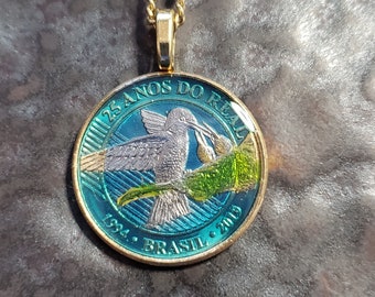 Coin from Brazil, hand painted by Ann Nolen,  Hummingbird.  Coin size Small, about 1 inch. Coin date 1994. Coin Jewelry.