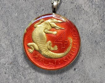 Hand Painted Gambia coin. Crocodile Pendant. 1-1/4 inch coin dated 1966.