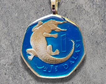 Hand Painted Gambia Coin. Crocodile Pendant by artist Ann Nolen.