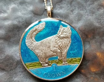 Isle of Man - Norwegian Forest Cat Coin Pendant - Hand Painted by Ann Nolen. Coin size large, about 1-1/2 inch. Coin date 1991..