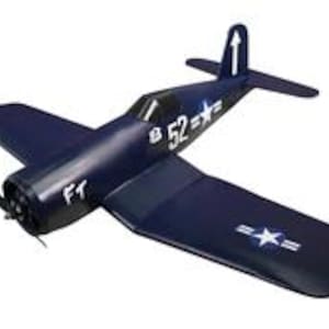 May include: A blue and white model aeroplane with the text "F1" and "8 52" on the side. The aeroplane has a white star on the wing and a white star on the tail.