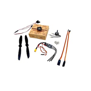 May include: A set of four small cardboard boxes with the text "AF 7100" printed on them, two black propellers, a small black and silver motor, a black electronic speed controller, and four sets of orange and yellow wires.