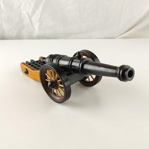 Brass Cannon with wooden Moving Wheels, Antique Brass Cannon Statue Figurine, Vintage Solid Brass Cannon Handcrafted Toy Model, Collectible