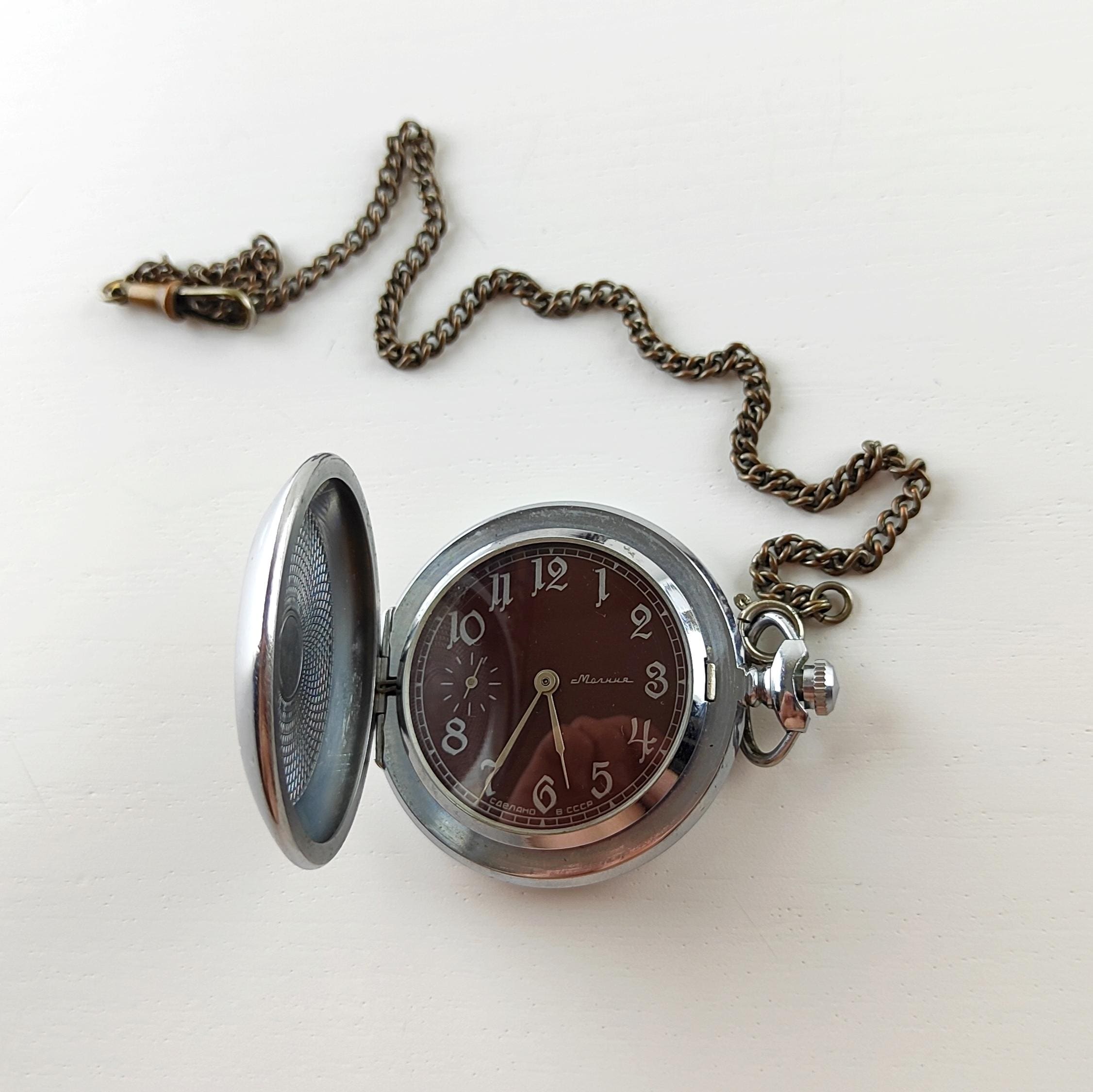 Taschenuhr aufziehen Österreich