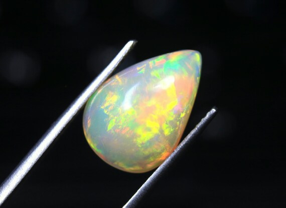 Welo Opal Gemstone, 3.85 CT Ethiopian Opal Pear Cabochon