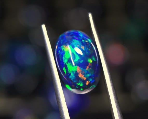 2.75 CT Ethiopian Welo Opal Cabochon: Rainbow Play of Color, October Birthstone
