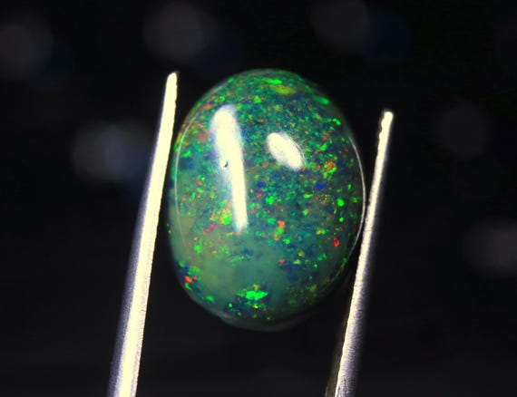 Black Ethiopian Opal Gemstone, 6.40 CT Oval Welo Opal Cabochon