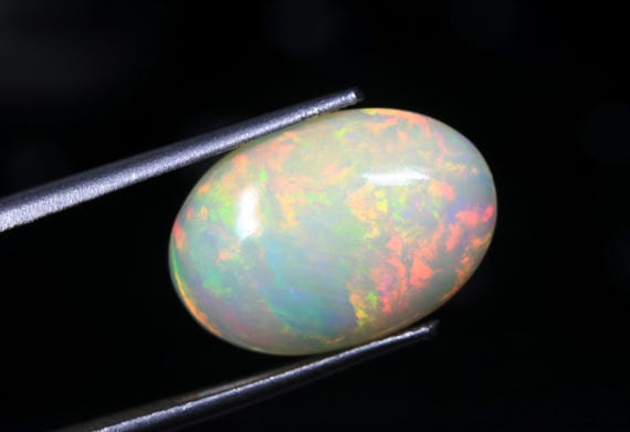 Welo Opal Cabochon: 4.80 CT Oval Ethiopian Fire Opal, October Birthstone