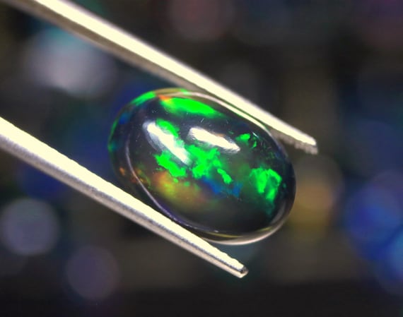 4.00 CT Ethiopian Black Opal Cabochon: Rainbow Fire Gemstone (14x9.70x6 MM)