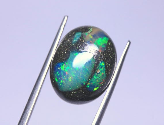 Natural Fire Opal Cabochon: 5.60 Carat Ethiopian Black Boulder Opal Loose Gemstone For Jewelry