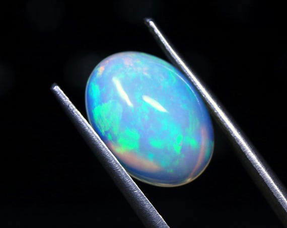 Hand Polished Ethiopian Fire Opal Cabochon: 2.80 CT Loose Gemstone