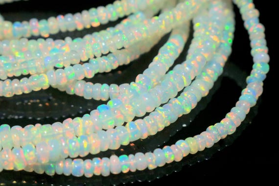 AAA Ethiopian Opal Rondelle Beads: Multi-Flashy Fire, 3-5mm